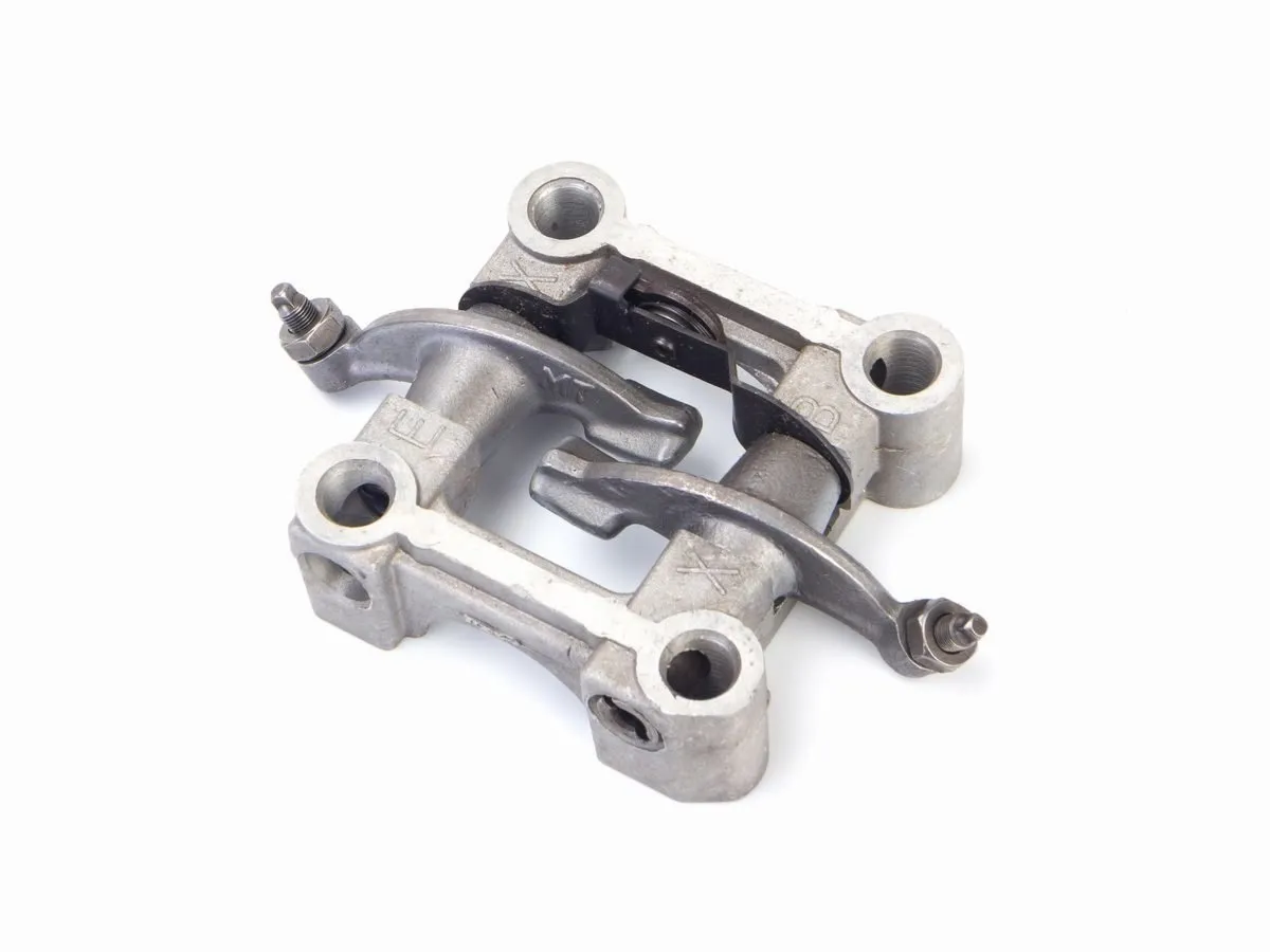 Dźwignie zaworów z mocowaniem wałka rozrządu  DELUX7 /kpl./