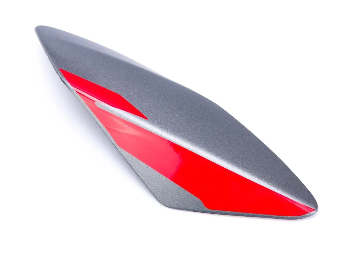 Owiewka lampy przedniej Pulsar125 P grafit/czer.nakl