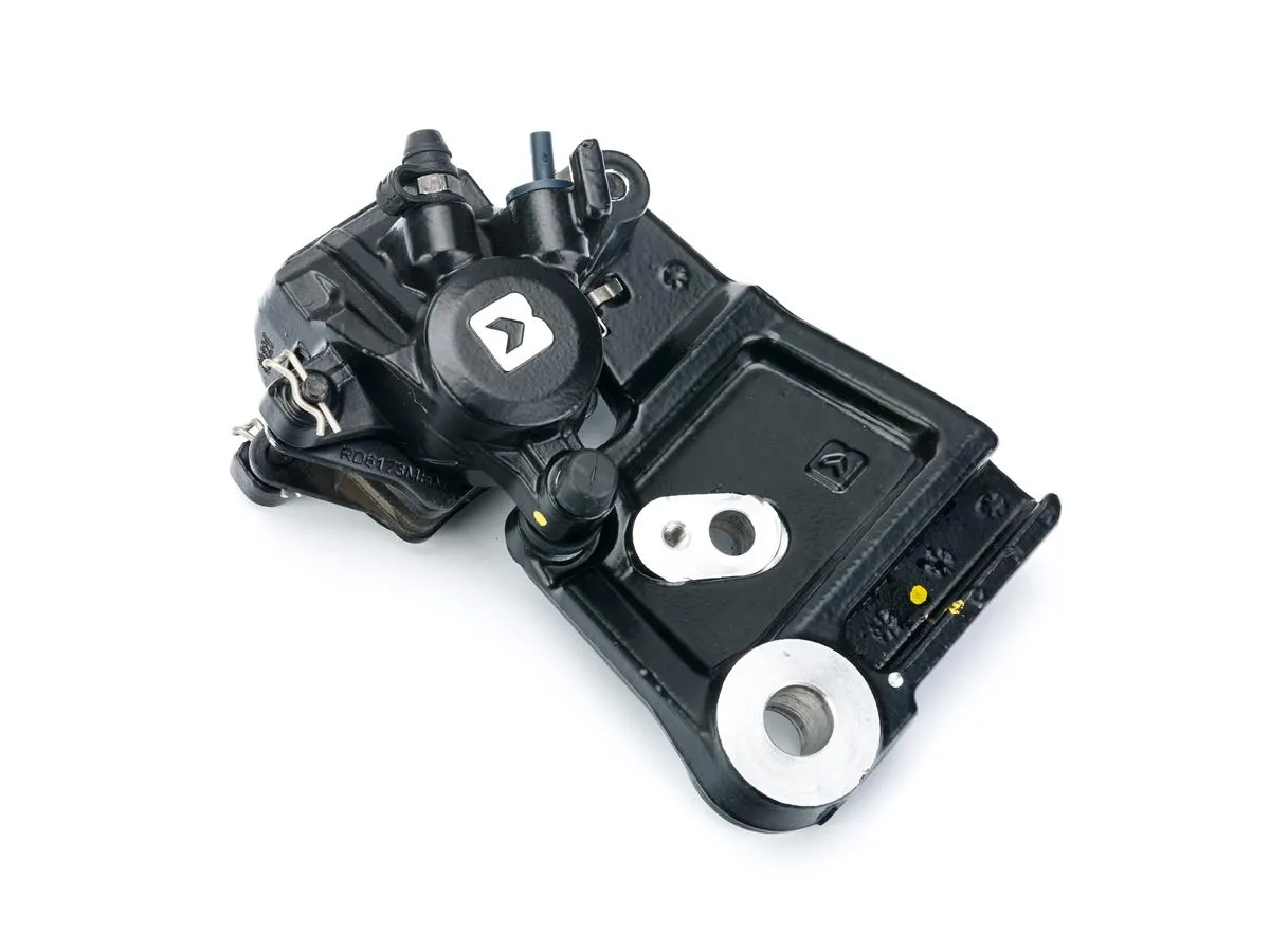 Zacisk hamulca tylnego Dominar400/22